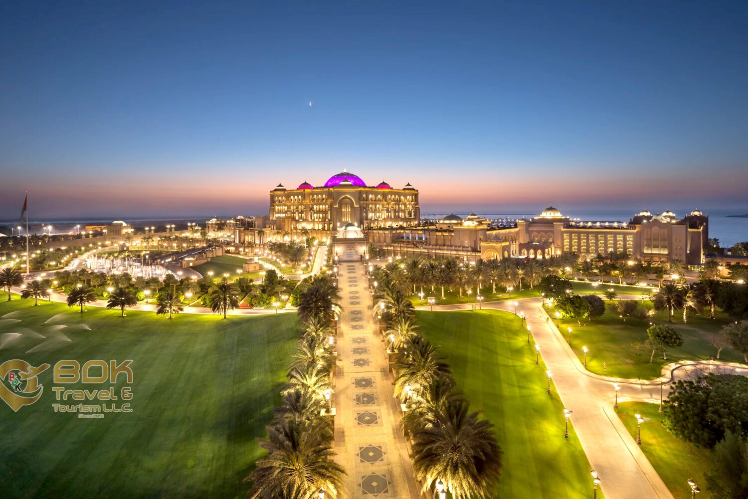View of the Emirates Palace Hotel entrance in Abu Dhabi at night
